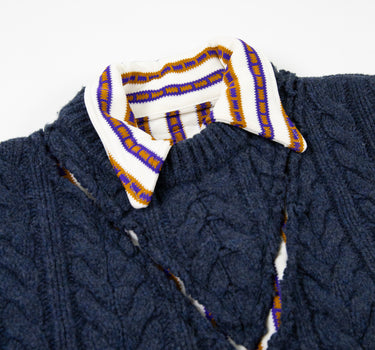 The front collar of the Maison Margiela FW16 Polo Cable Knit Sweater in navy.