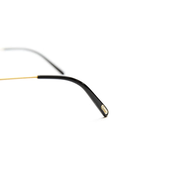 The detail of the Cartier Plated Oval Sunglasses with Custom Cognac Gradient Lenses.