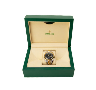 The watch inside the box of the Rolex Datejust 41mm 2019 Blue face.
