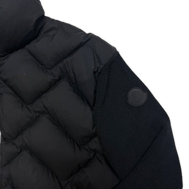 The logo of the Moncler Quilted Shell Ribbed Knit Cardigan Jacket.