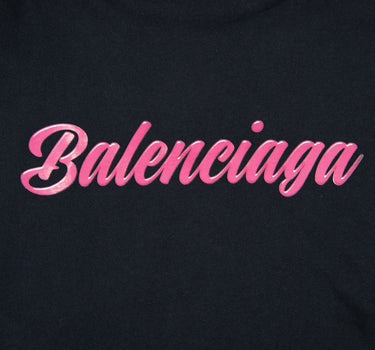 The logo on the front of the Balenciaga Pink Logo T-shirt in black.
