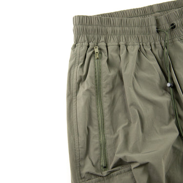The pocket of the Represent Green Cargo Trousers.