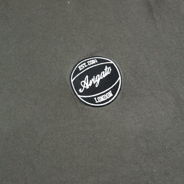 The logo of the Axel Arigato Dunk Grey T Shirt.
