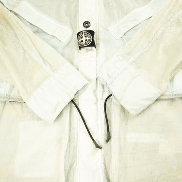 The logo of the Stone Island Reflective Grid On Lamy-TC Jacket.