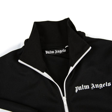 The collar and inside label of the Palm Angels Black Track Jacket.