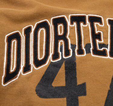 Logo on the front of the Dior x Denim Tears Brown Sweatshirt.