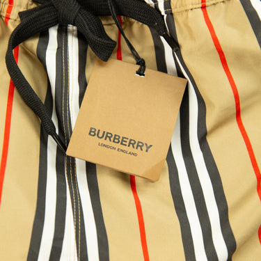 The tags of the Burberry Striped Check Print Swim Shorts.