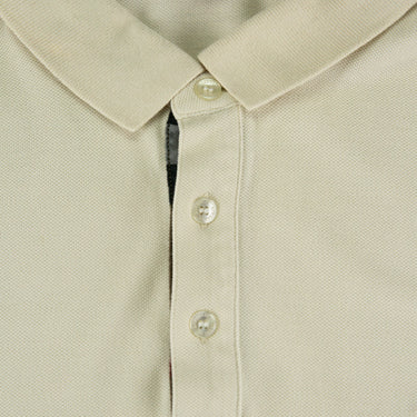 The buttons of the Burberry Beige Polo Shirt.