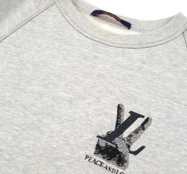 The logo on the grey Louis Vuitton Peace & Love Sweatshirt.