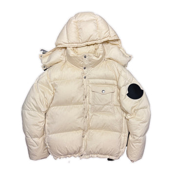 The front of the Moncler Twist Huarez Cream Puffer Jacket.