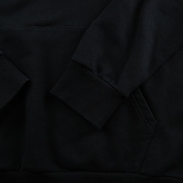 The sleeve of the Palm Angels Aspen Logo Print Black Hoodie.