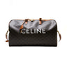 The front of the Celine Voyage bag in Triomphe Canvas with Celine print.