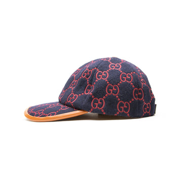 The left of the Gucci Embroidered GG Canvas Baseball Hat.