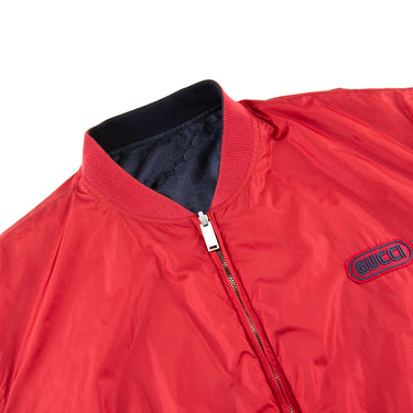 The collar of the Gucci Monogram Reversible Bomber.