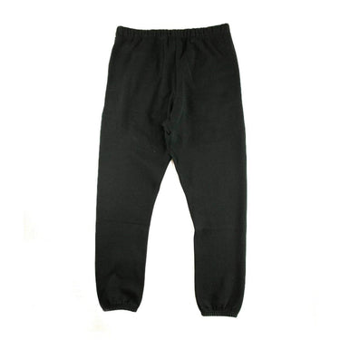 The back of the Fear Of God ESSENTIALS Stretch Limo Sweatpants S.