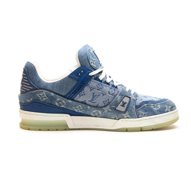 The left of the Louis Vuitton LV Denim Monogram Trainer.