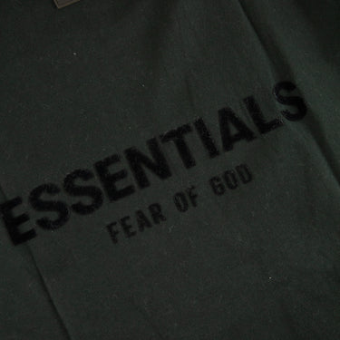 The logo of the Fear Of God ESSENTIALS Stretch Limo T Shirt.