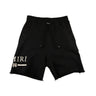 The front of the Amiri Black Shorts.