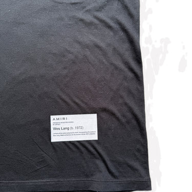The back logo of the Amiri Wes Lang Solar Kings Black T Shirt.