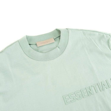 The collar of the Fear Of God ESSENTIALS Sycamore T Shirt L.