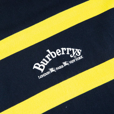 The logo of the Burberry Embroidered Logo Yellow Navy Striped T Shirt.