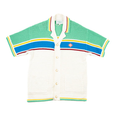 The front of a Casablanca Multicolor Crochet Tennis Shirt in white with blue, green, yellow, and red stripes.