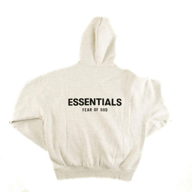 The back of the Fear Of God ESSENTIALS Light Oatmeal Hoodie M.
