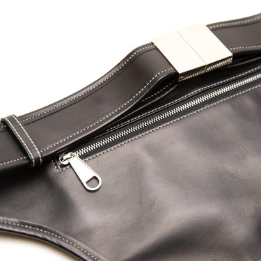 The buckle of the Burberry Smooth Calfskin Brummell Black Bum Bag.