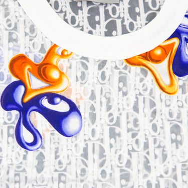 The collar of the Dior x Kenny Scharf Oblique Mesh T Shirt.