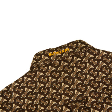 The logo of the Burberry TB Monogram Overshirt Jacket.