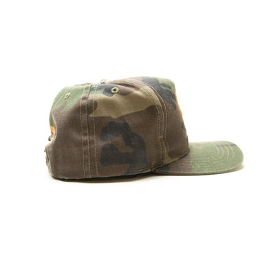 The logo of the Chrome Hearts CH Camo Trucker Hat.