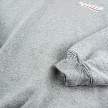 The sleeve of the Balenciaga Campaign Logo Grey Sweatshirt.