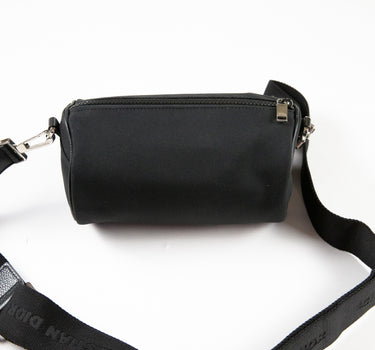 The back of the Dior x Sorayama Black Roller Bag, highlighting its structure.