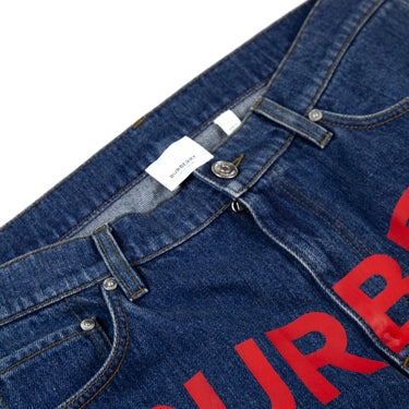 Inside view of Burberry Red Horseferry Print Jeans, showing the label.