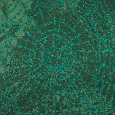The logo of the Stone Island x Supreme FW23 Dark Green T Shirt.