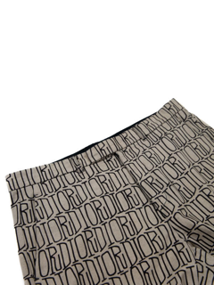 The waistband of the Dior x Stussy All Over Jeans.