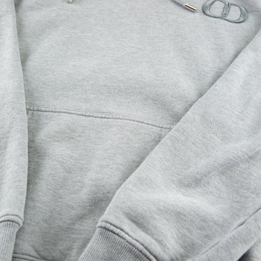 The sleeve of the Dior CD Icon Grey Hoodie.