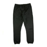 The front of the Fear Of God ESSENTIALS Stretch Limo Sweatpants.