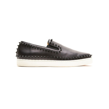 The right of the Christian Louboutin Black Spike Boat Shoes.