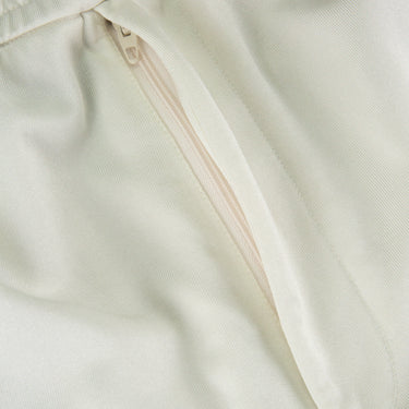 The zip of the Dior x ERL Acetate 47 Shorts.