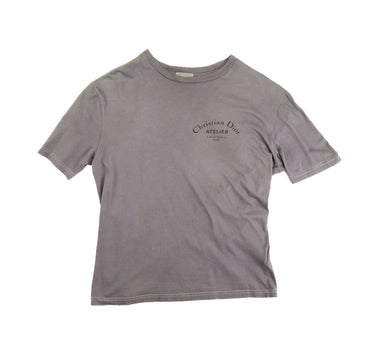 The front of the Dior Atelier Purple Dyed T-Shirt .