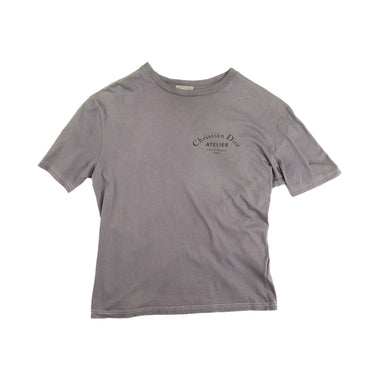 The front of the Dior Atelier Purple Dyed T-Shirt .