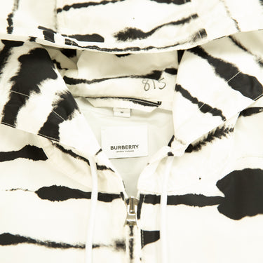 The inside label of the Burberry Watercolour Print Windbreaker Jacket.
