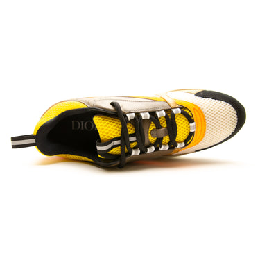 The top of the Dior B22 Ebony Camel Yellow Calfskin Trainer.
