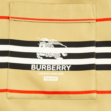 The logo of the Burberry x Supreme Icon Silk Pajama Shirt Archive Beige.