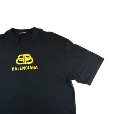 The front of the Balenciaga Yellow BB Logo Black T Shirt.