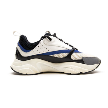 The left of the Dior B22 Blue White Grey Trainers.