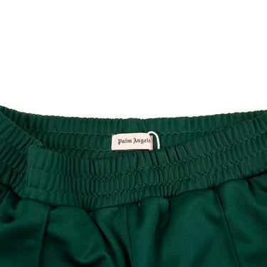 The inside label of the Palm Angels Pine Green Sweatpants.