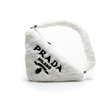 The front of a Prada White Terrycloth Triangle Bag.