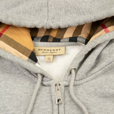 The inside label of the Burberry Check Hood Grey Zip Hoodie.